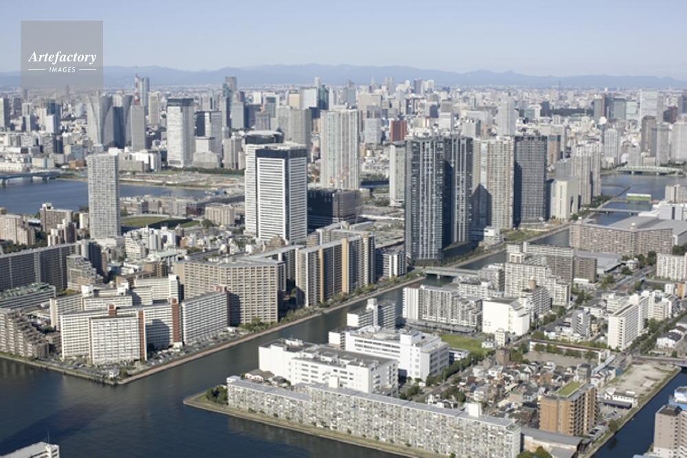枝川を手前に豊洲、月島都心のビル群